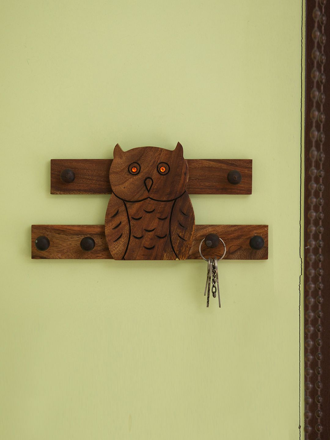 ExclusiveLane Brown Wall Mounted Wooden Hand Carving Key Holder Price in India