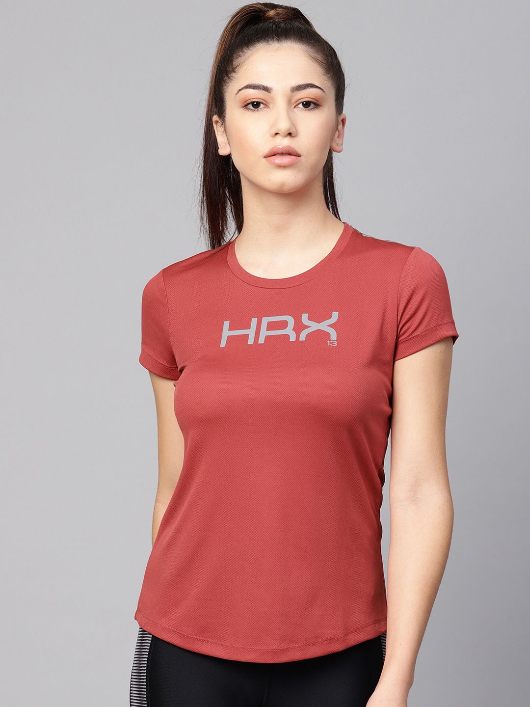 HRX by Hrithik Roshan Women Rust Red Running Rapid Dry Solid Regular Fit T-shirt Price in India