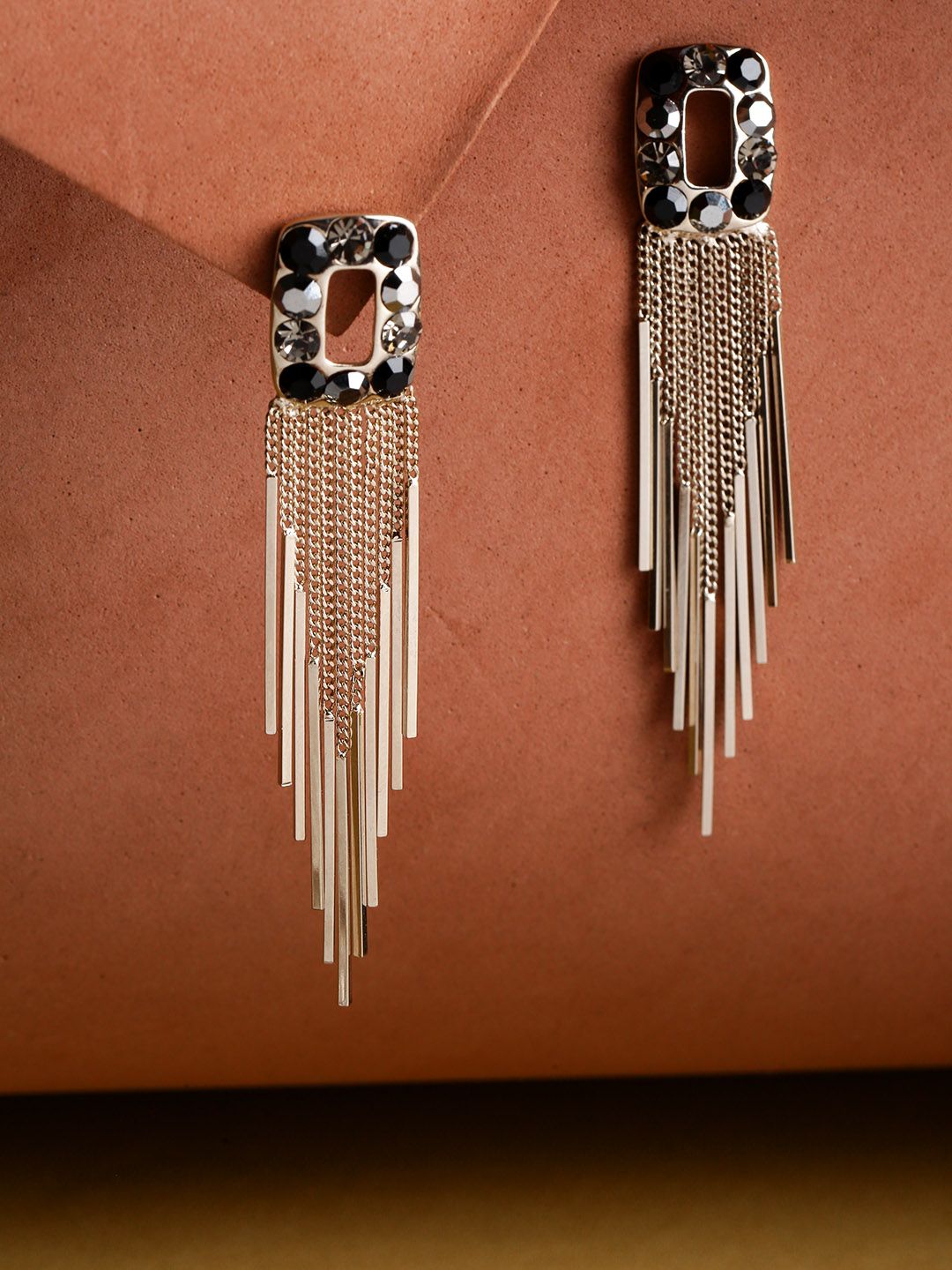 Jewels Galaxy Silver-Toned & Black Gold-Plated Stone-Studded Tasselled Drop Earrings Price in India
