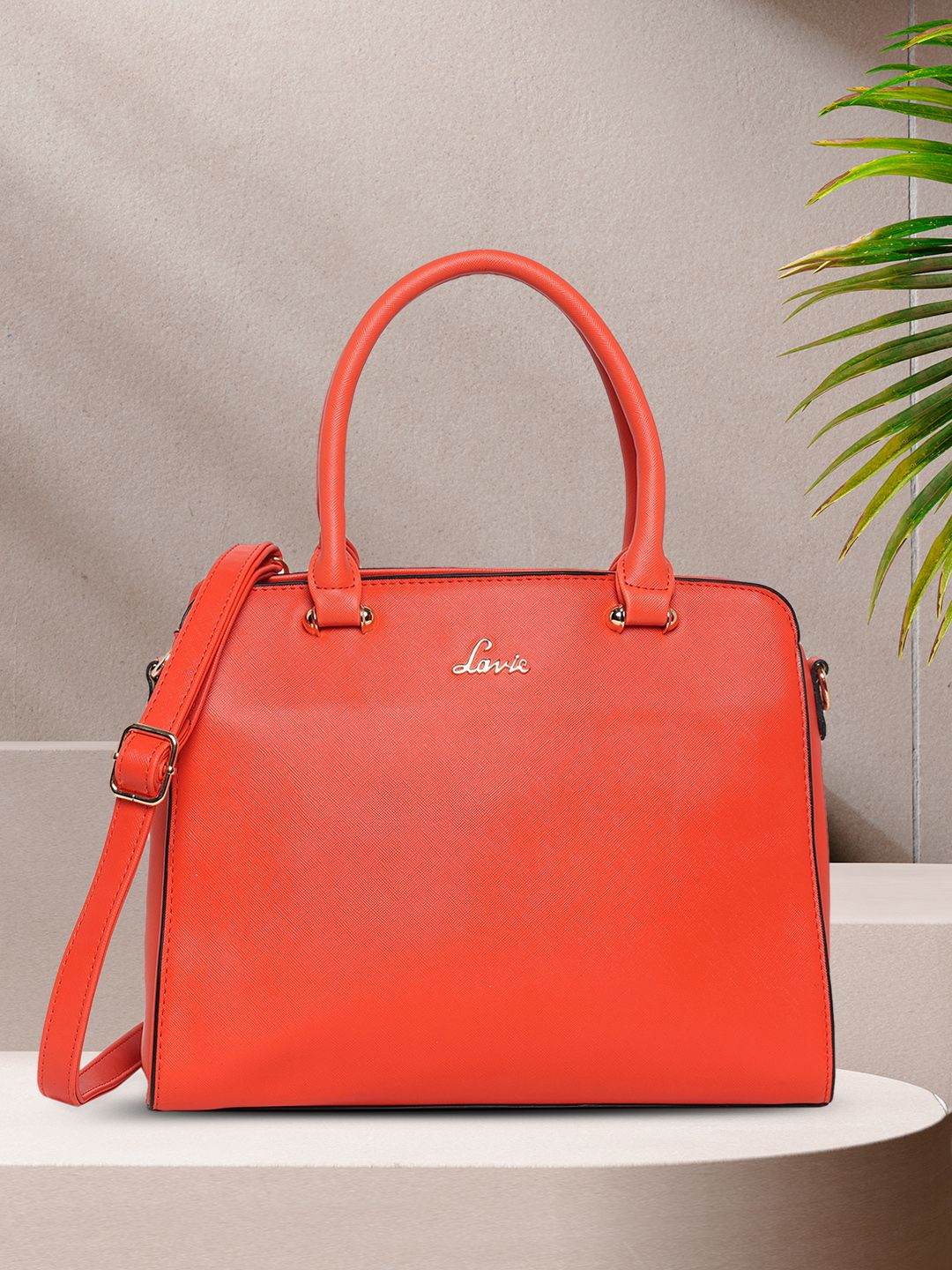 Lavie Coral Red Solid Handheld Bag Price in India