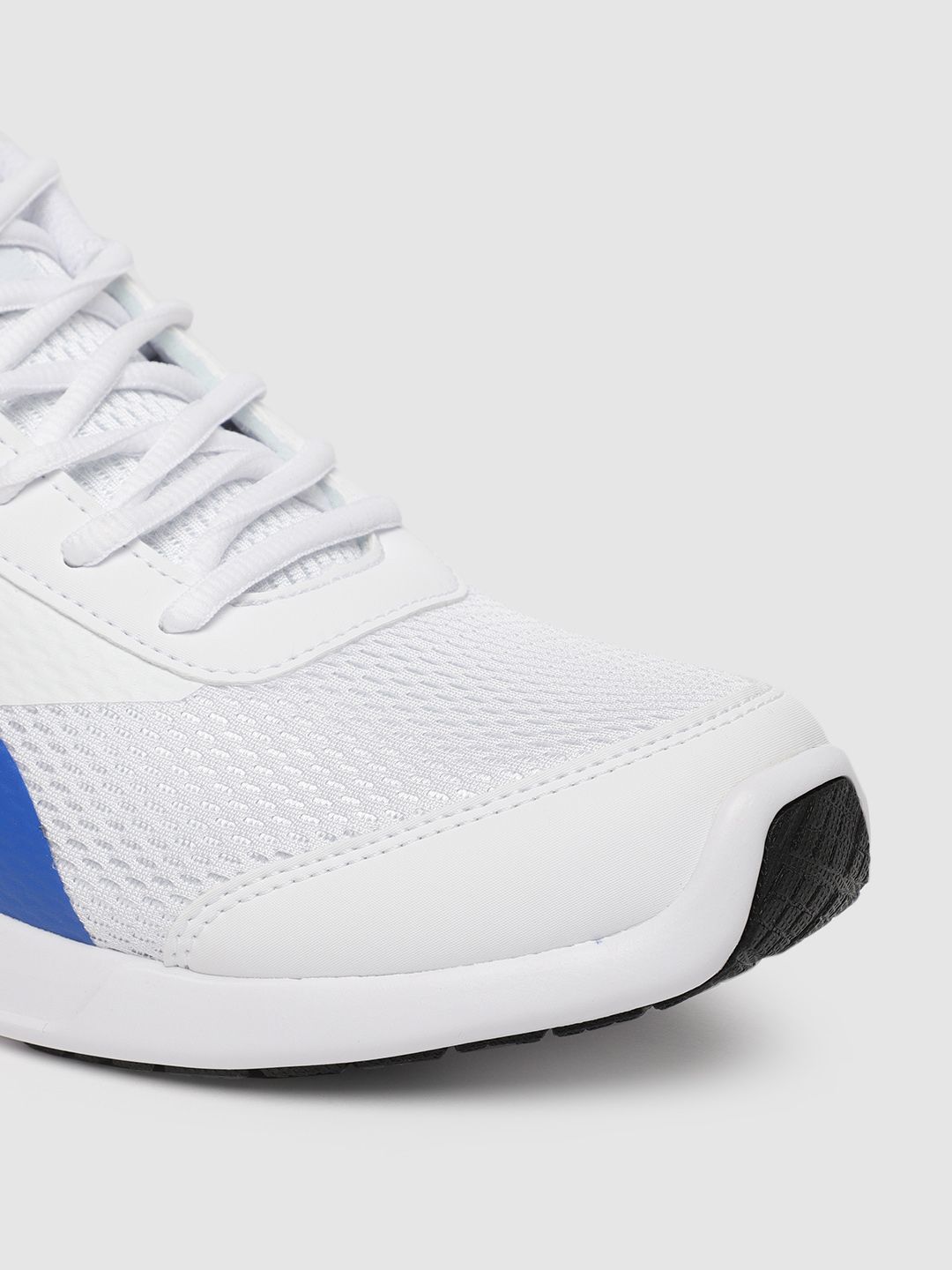 Myntra Puma Men White Tazon Ii Running Shoes Buy Puma Men  display picture 1