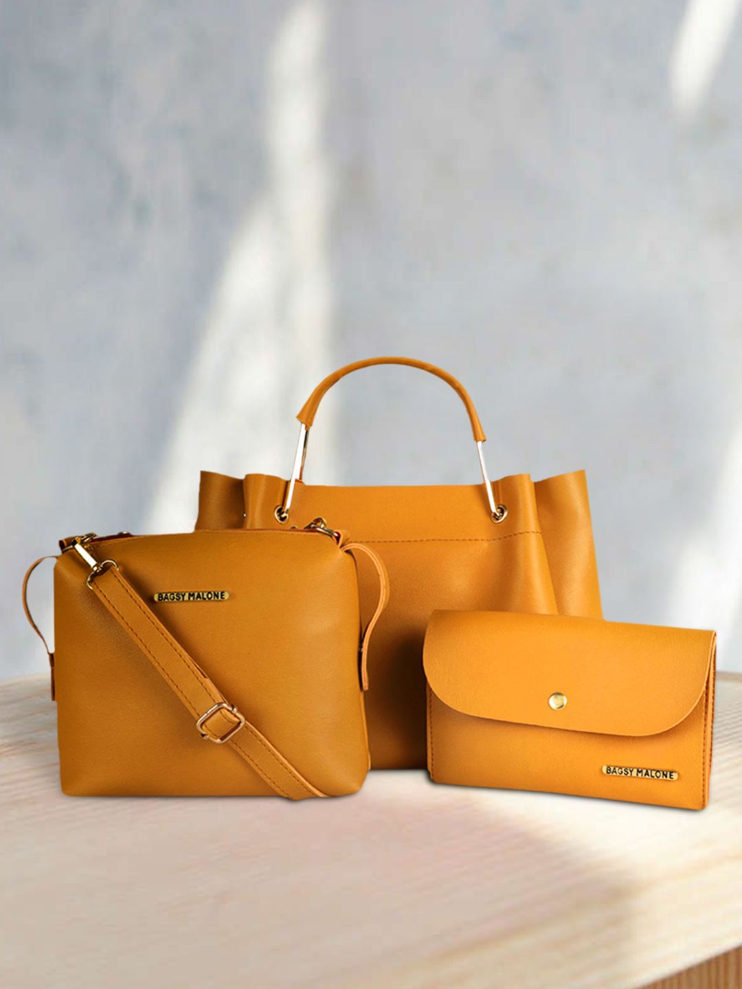 Bagsy Malone Mustard Yellow Solid Handheld Bag with Sling Bag and Clutch Price in India