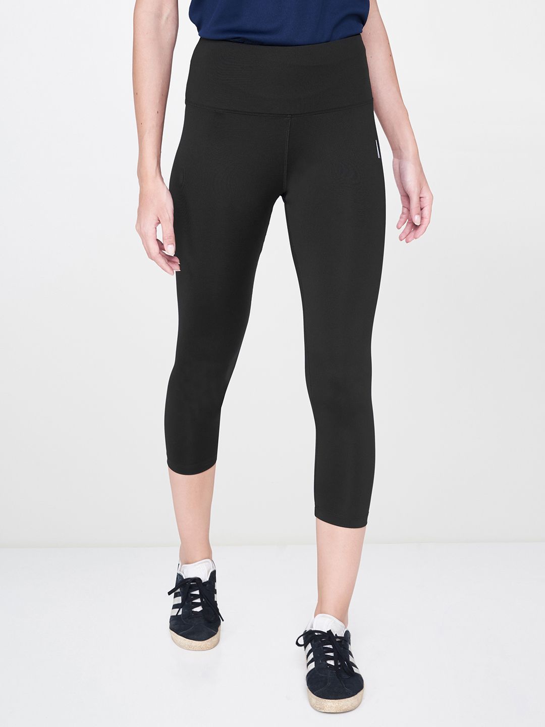 AND Women Black Solid Knitted Cropped Activewear Tights Price in India