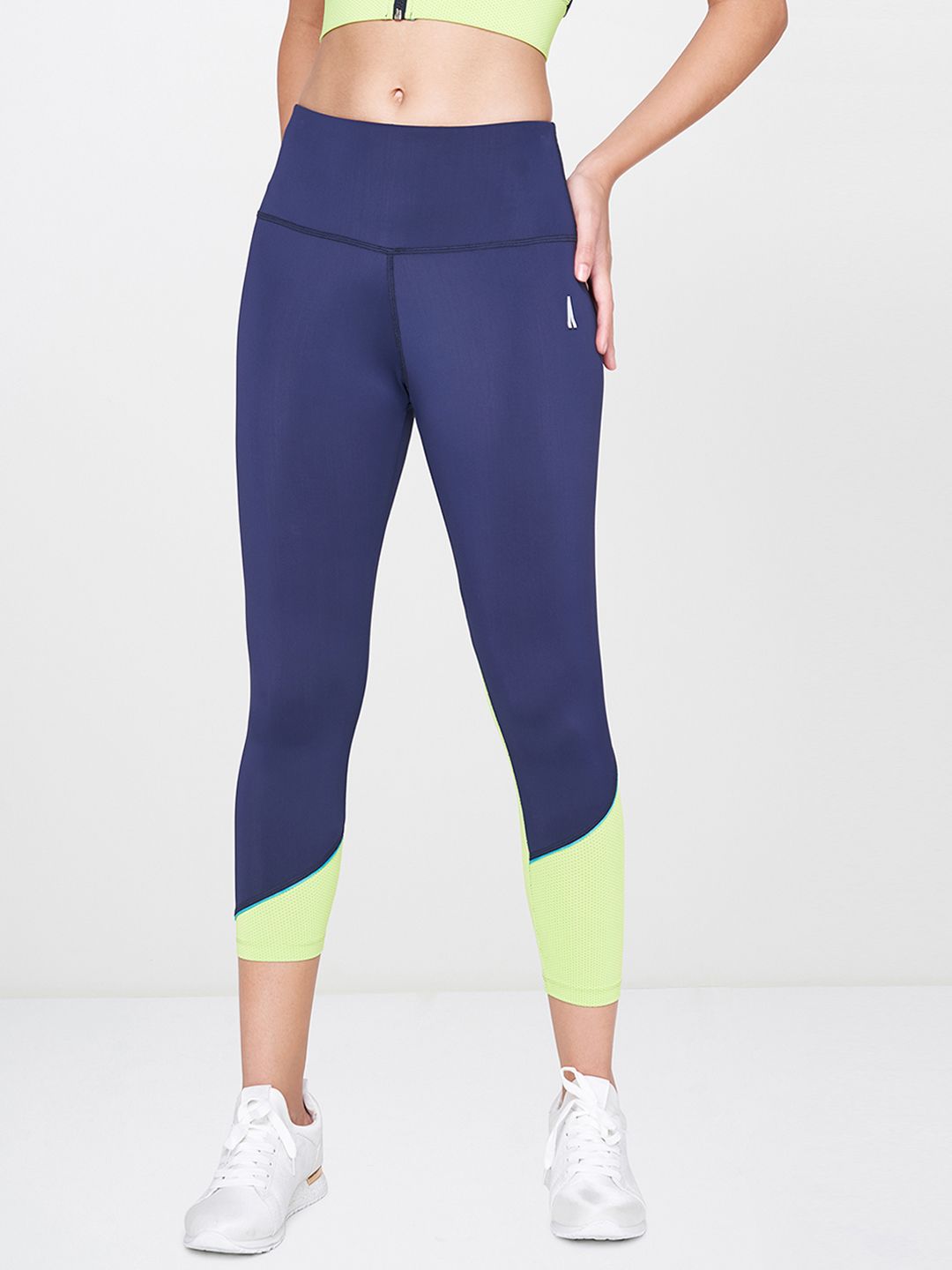 AND Women Blue & Fluorescent Green Solid 3/4th Activewear Tights Price in India