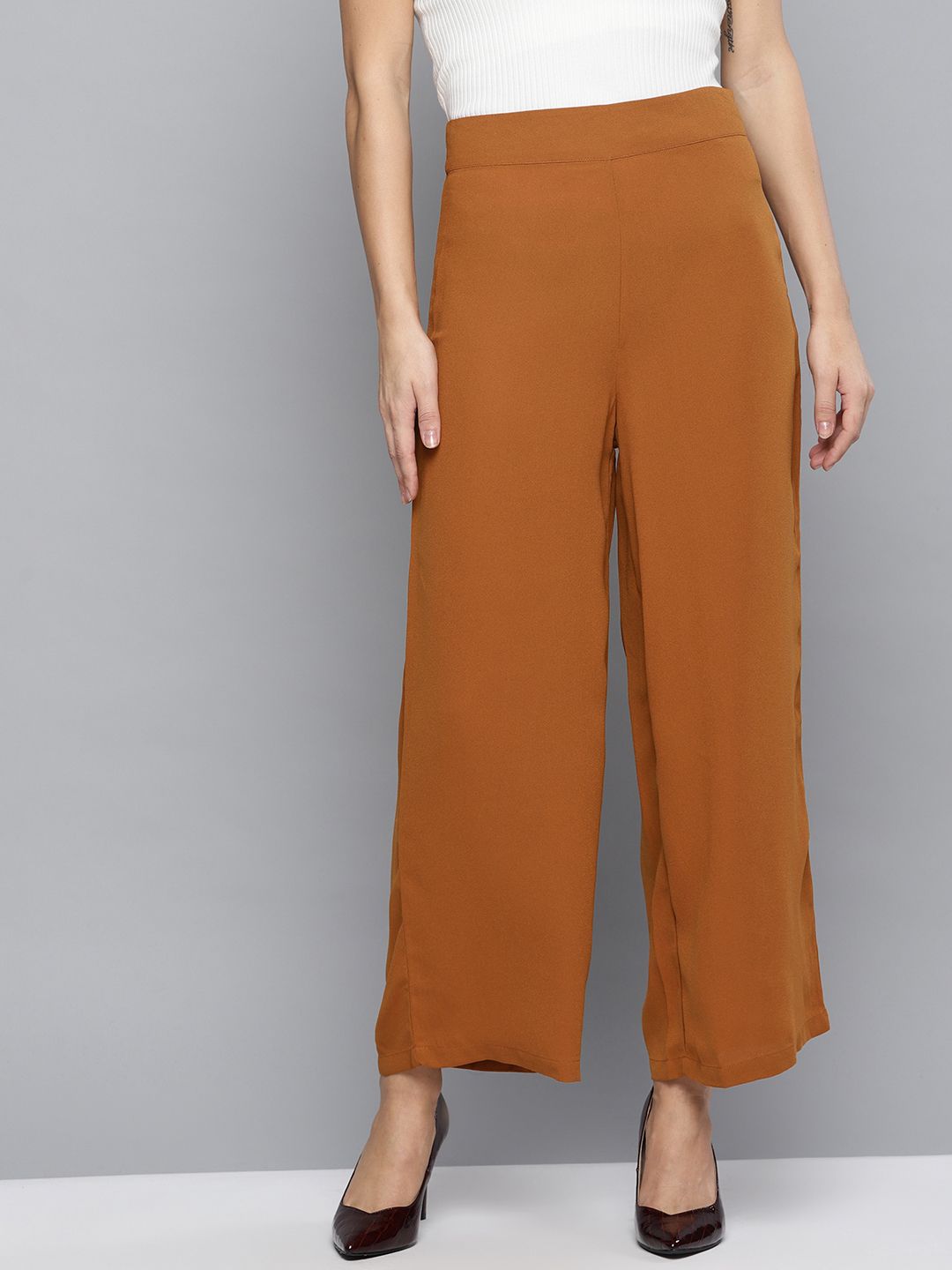 RARE Women Brown Parallel Trousers Price in India