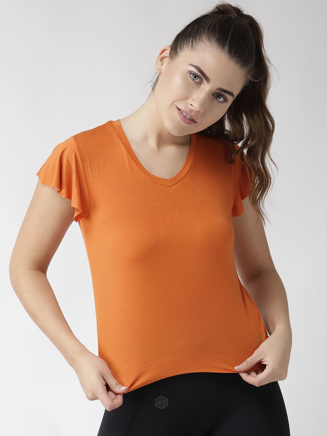 Alcis Women Orange Solid V-Neck T-shirt Price in India