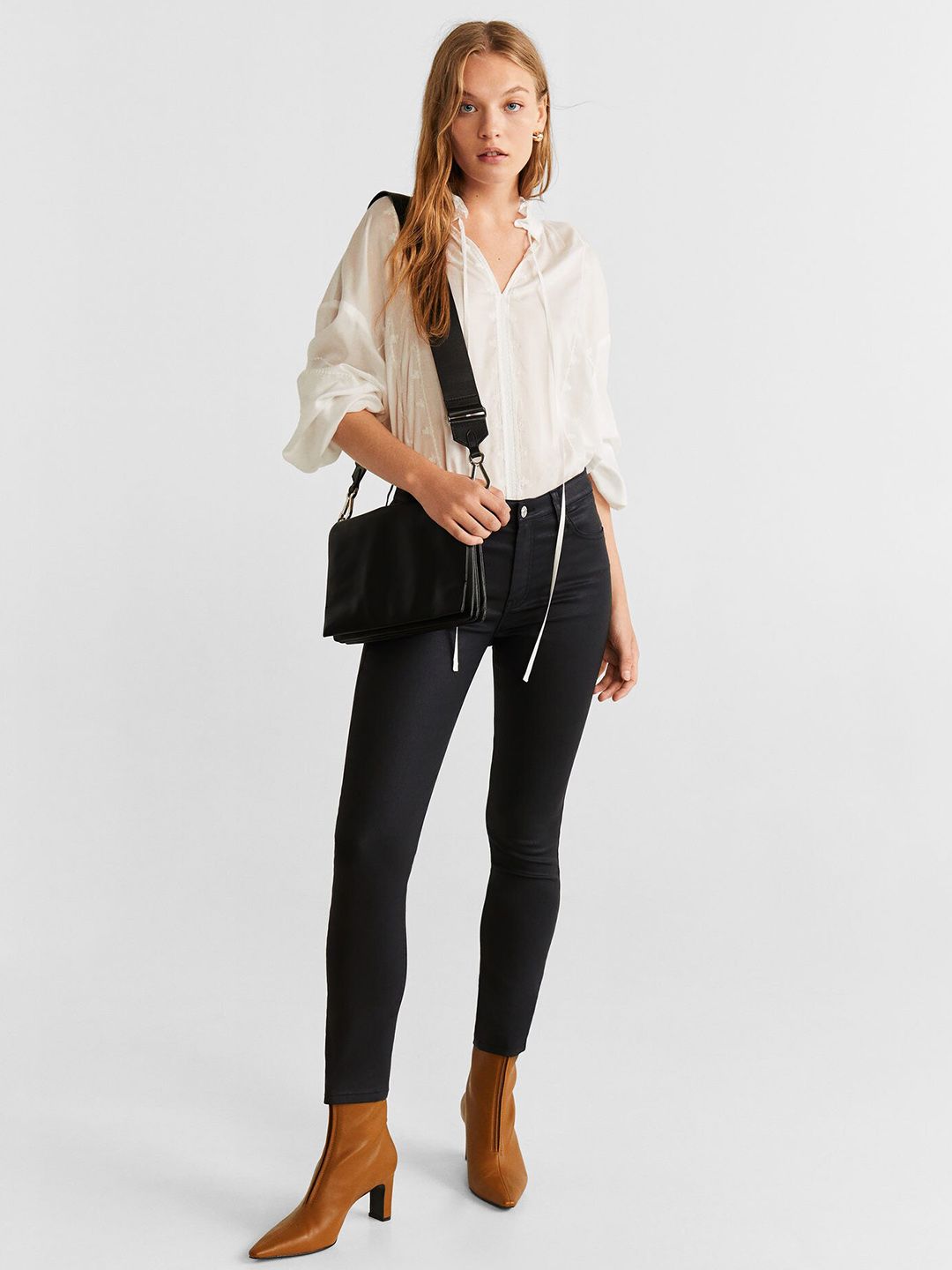Black Skinny Fit Mid-Rise Clean Look Coated Stretchable Jeans