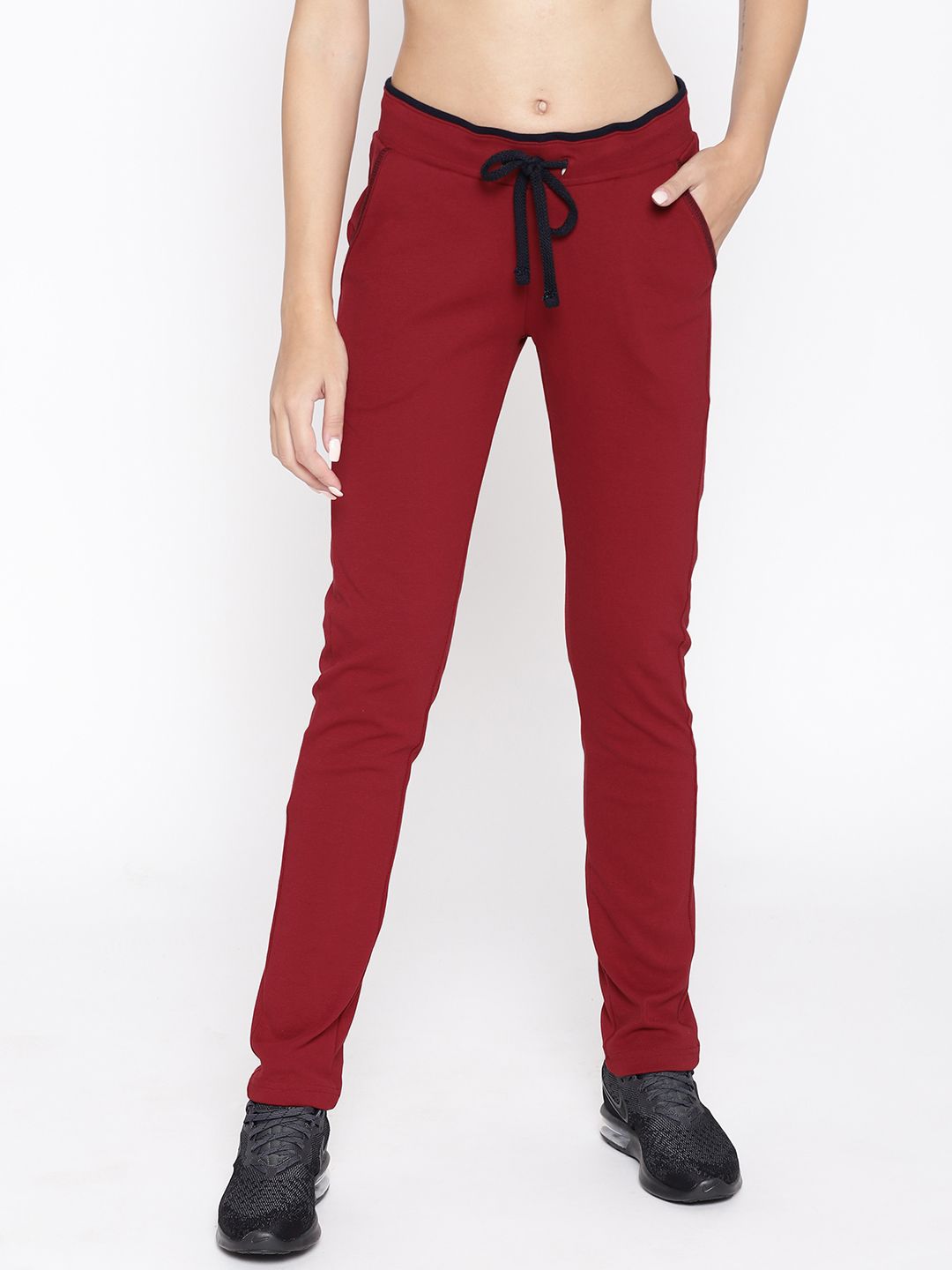 Cayman Women Maroon Solid Track Pants Price in India