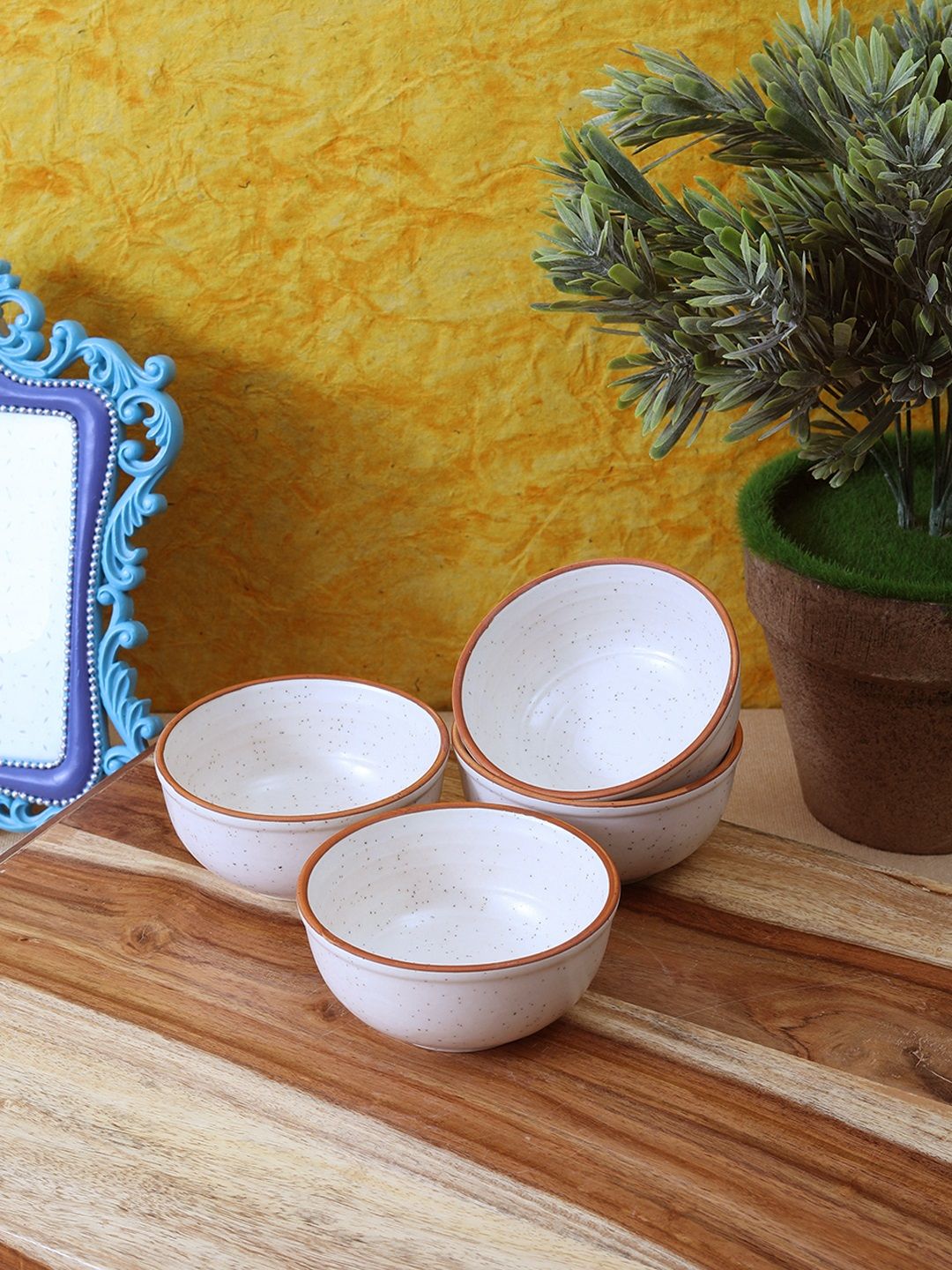 VarEesha Set of 4 White Solid Ceramic Bowls Price in India