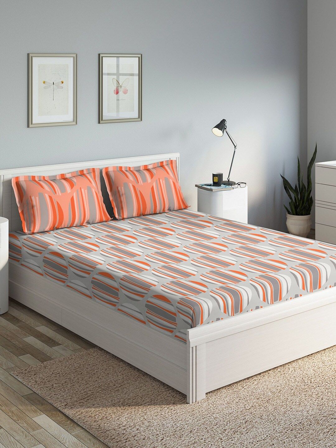 DDecor Orange Abstract 140 TC Cotton 1 Queen Bedsheet with 2 Pillow Covers Price in India