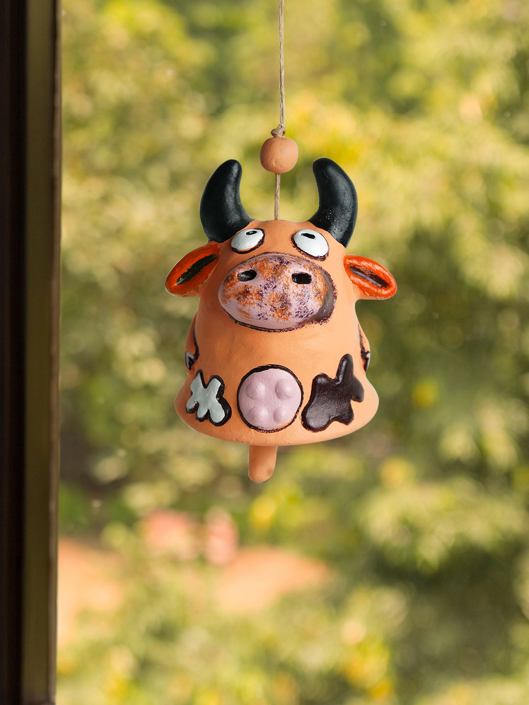 ExclusiveLane Multicoloured Cow Shaped Handmade & Hand-Painted Terracotta Garden Wind Chime Price in India