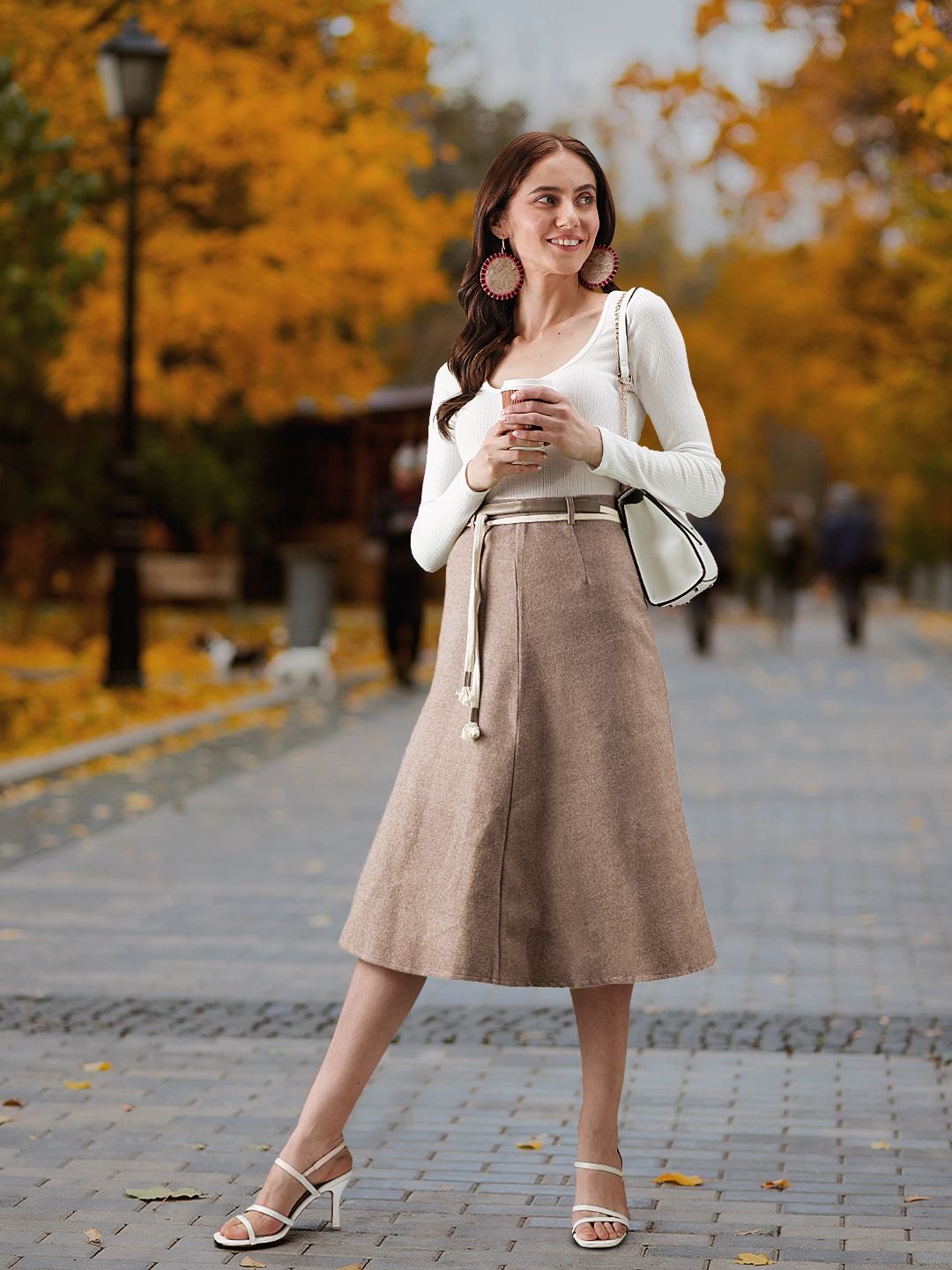 Buy Tokyo Talkies Women Beige Flared Knee-Length Solid A-Line