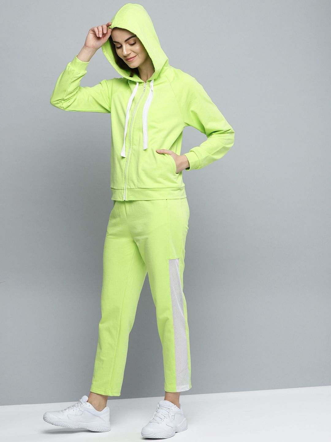 Besiva Women Fluoroscent Green Solid Track Suit Price in India