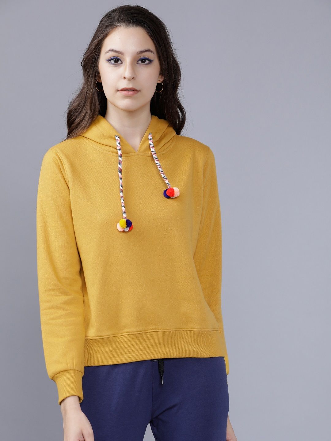 Tokyo Talkies Women Mustard Solid Hooded Sweatshirt Price in India