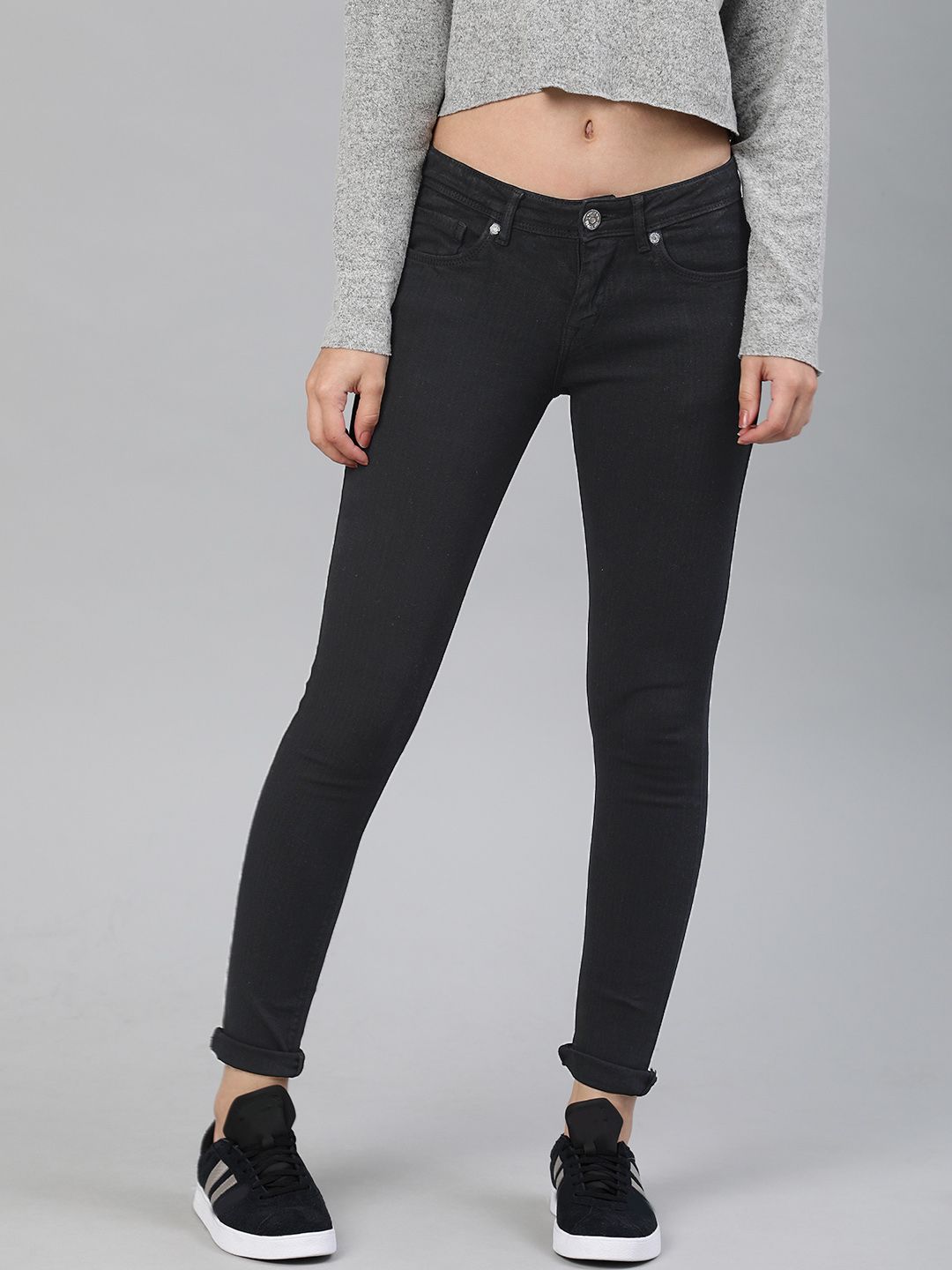American Crew Women Black Slim Fit Mid-Rise Clean Look Stretchable Jeans Price in India