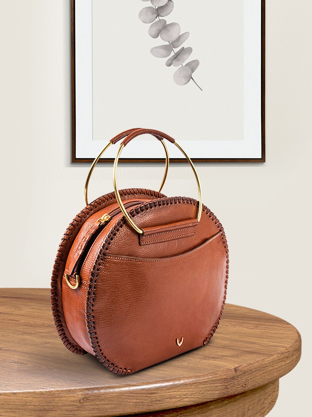 Hidesign Brown Solid Leather Handheld Bag Price in India