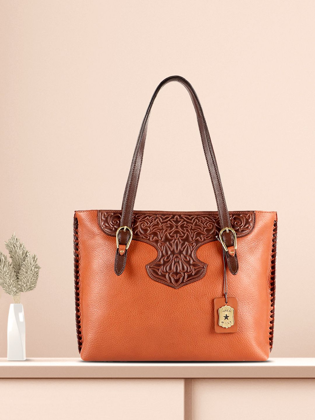 Hidesign Tan Brown Textured Leather Handheld Bag Price in India