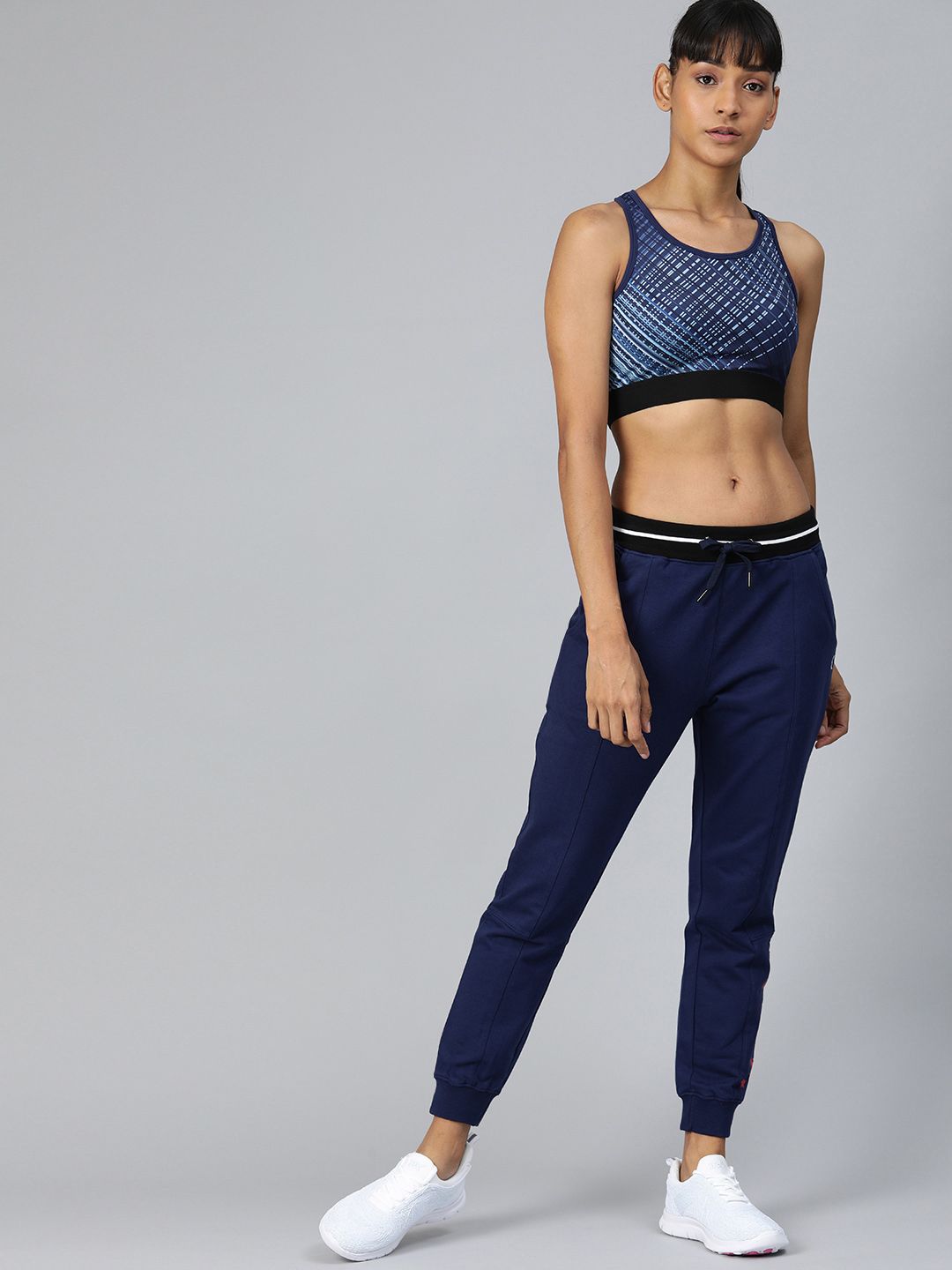 HRX by Hrithik Roshan Women Navy Blue Solid Lifestyle Joggers with Printed Detail Price in India