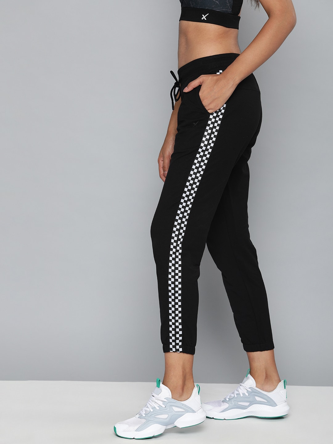HRX by Hrithik Roshan Women Black Solid Regular Fit Lycra Lifestyle Cropped Joggers Price in India