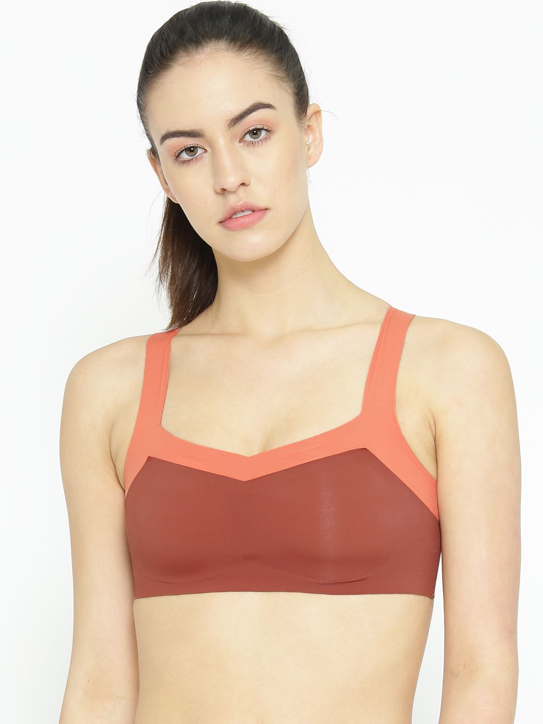 EROTISSCH Rust Orange Solid Non-Wired Lightly Padded Sports Bra AIB-16B Price in India