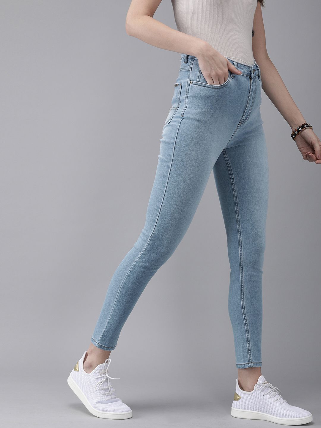 The Roadster Lifestyle Co Women Blue Super Skinny Fit High-Rise Clean Look Stretchable Cropped Jeans Price in India