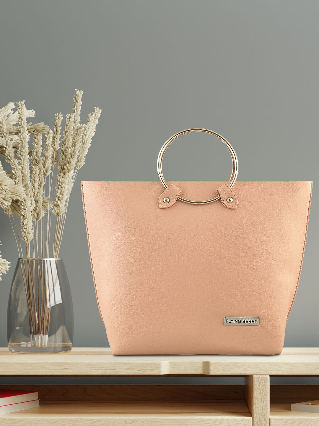 FLYING BERRY Peach-Coloured Solid Handheld Bag Price in India