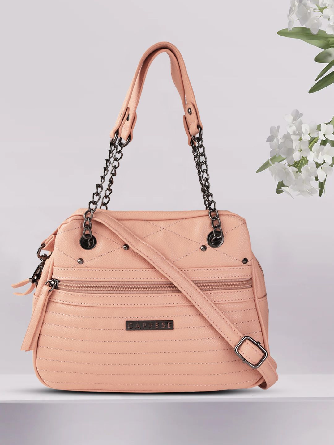 Caprese Peach-Coloured Quilted Handheld Bag Price in India