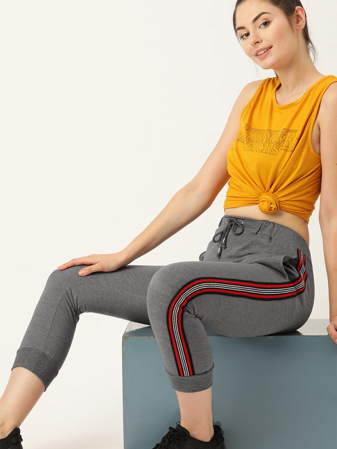 DressBerry Women Charcoal Grey Solid Cropped Joggers Price in India