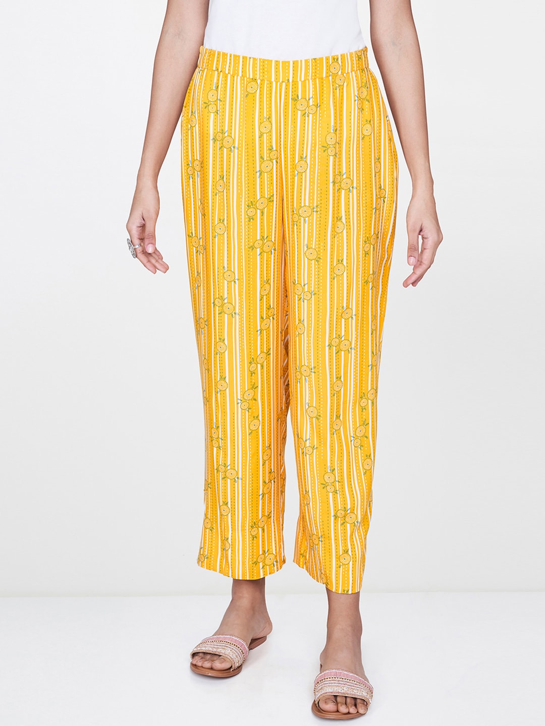 Global Desi Women Mustard Yellow & White Relaxed Straight Fit Printed Regular Trousers Price in India