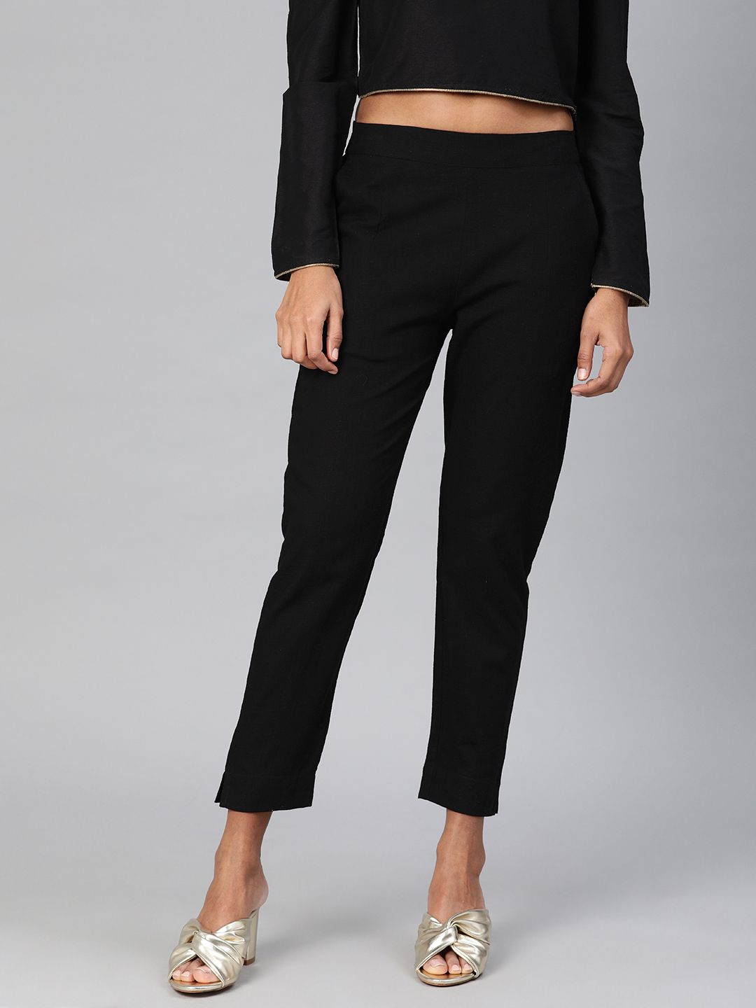 Divena Women Black Straight Fit Solid Regular Trousers Price in India