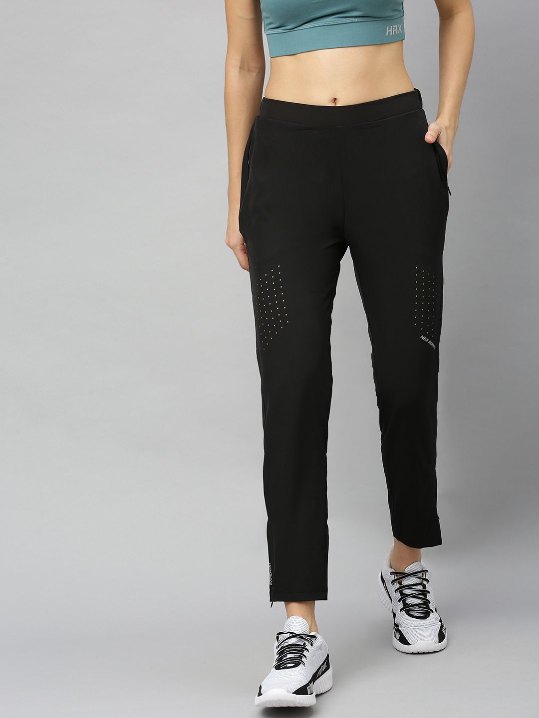 HRX by Hrithik Roshan Women Jet Black Solid Slim fit Rapid-Dry Running Track Pants Price in India