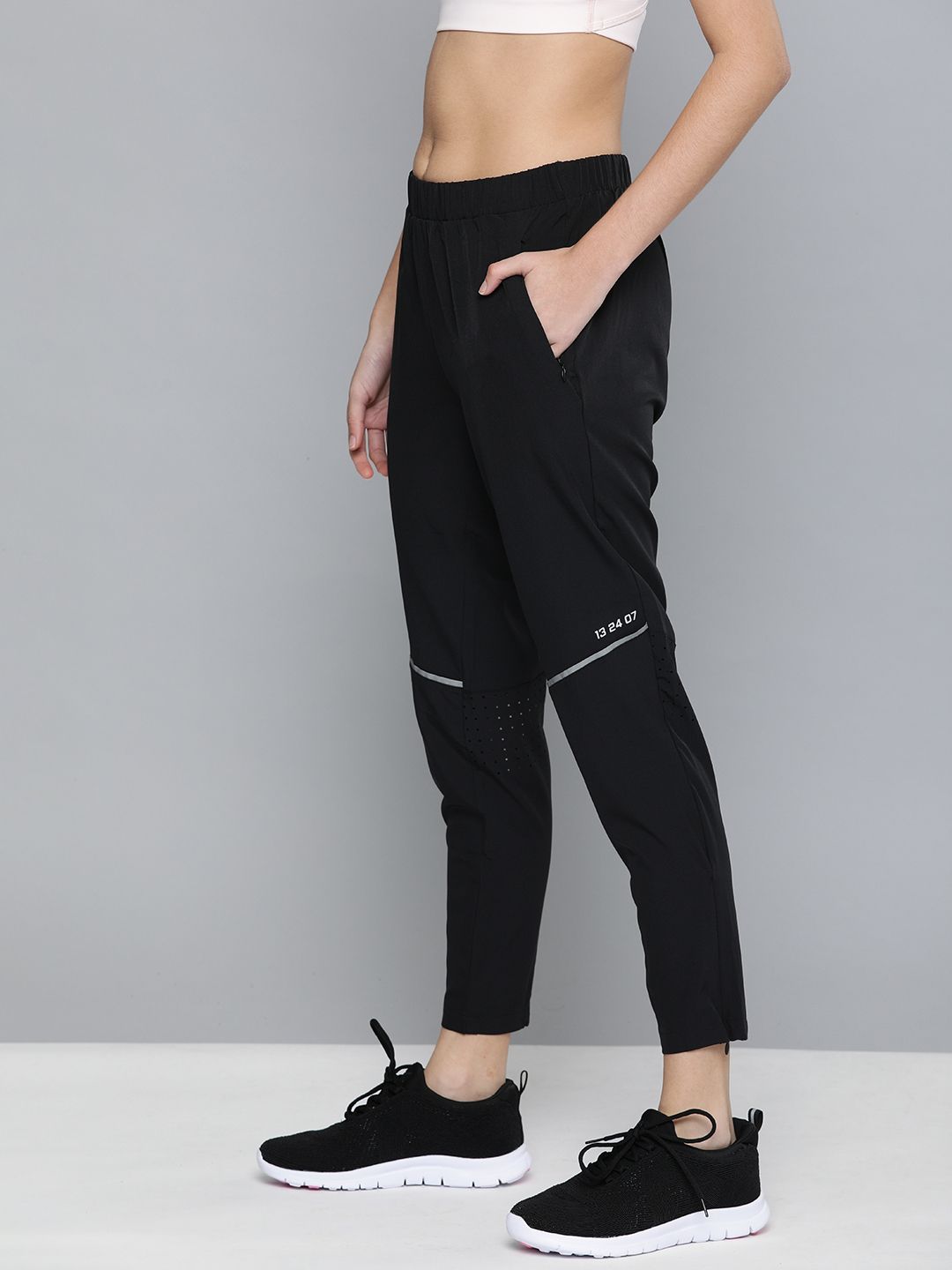 HRX by Hrithik Roshan Women Black solid Rapid Dry Antimicrobial Training Track Pants Price in India