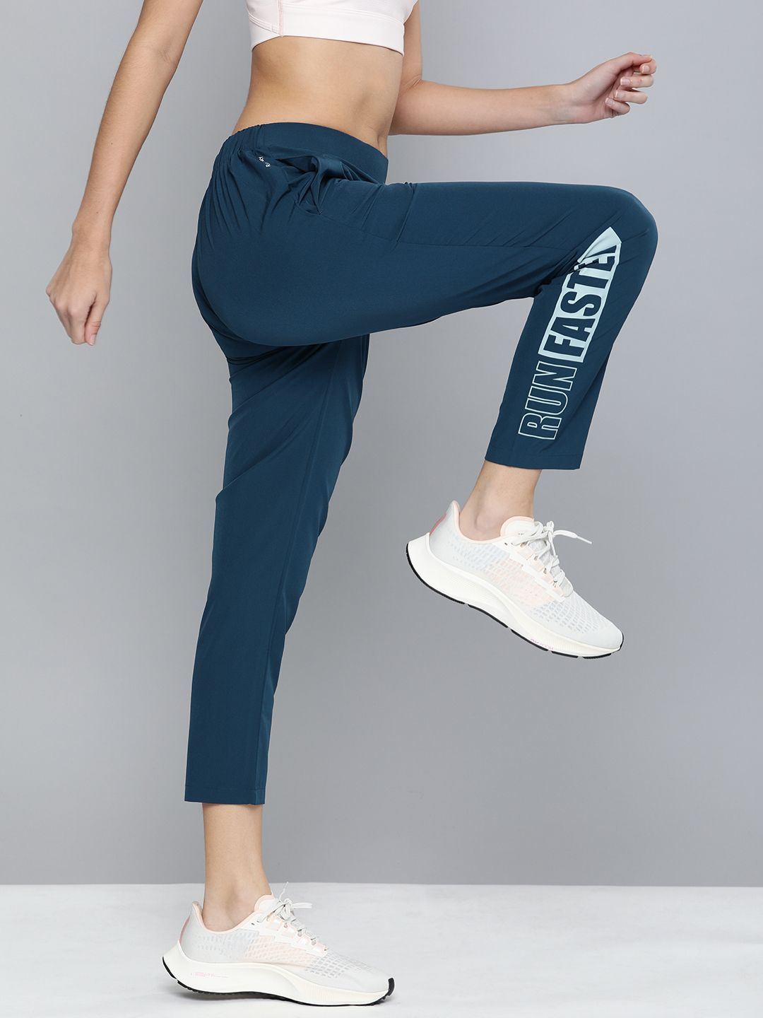 HRX by Hrithik Roshan Women Teal Blue Printed Rapid Dry Antimicrobial Running Track Pants Price in India