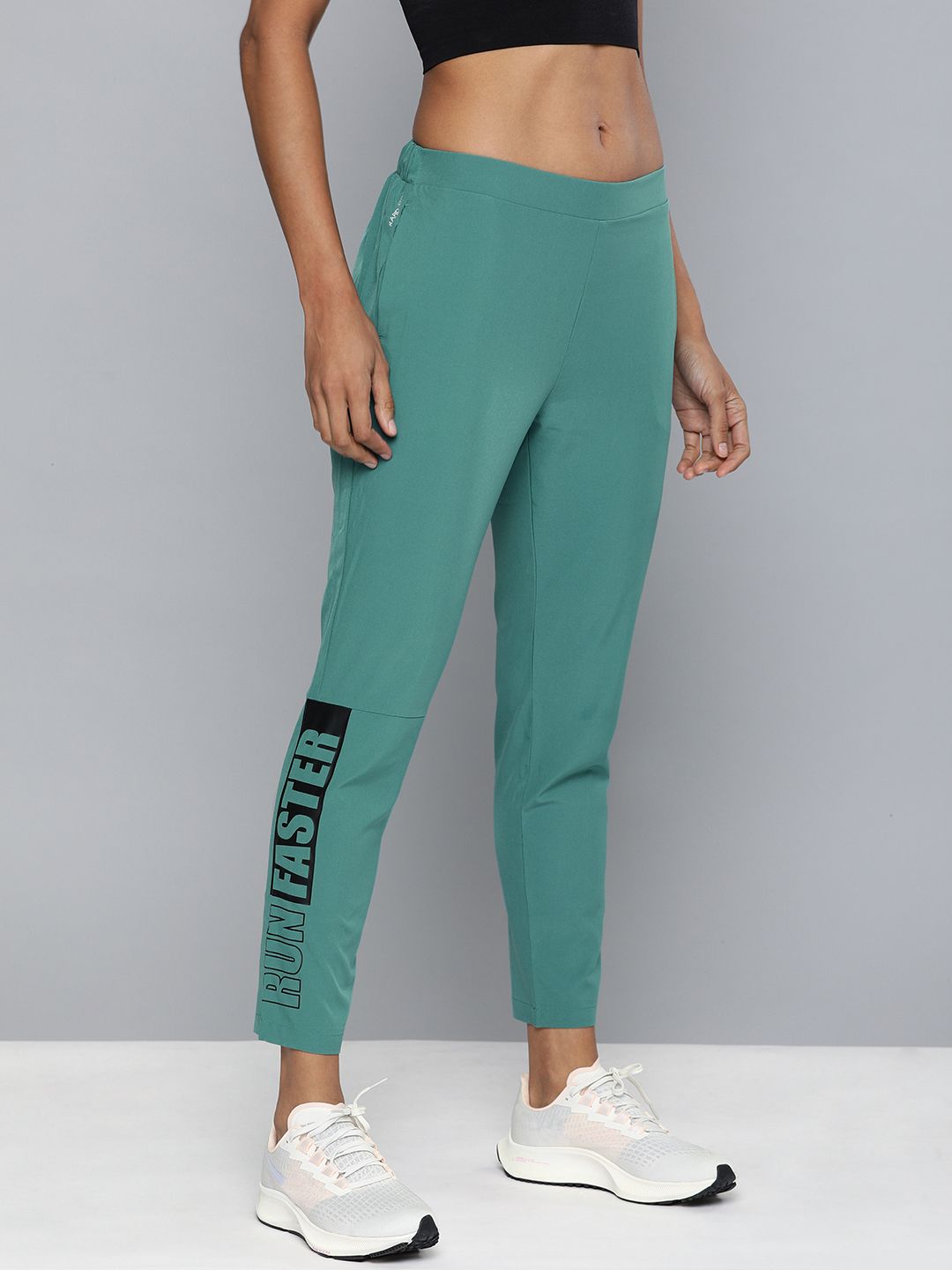 HRX by Hrithik Roshan Women Sea Green Printed Rapid Dry Antimicrobial Running Track Pants Price in India