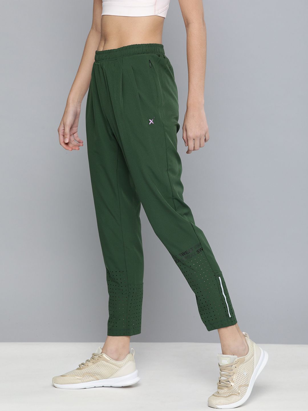 HRX by Hrithik Roshan Women Green solid Slim Rapid Dry Antimicrobial Training Track Pants Price in India