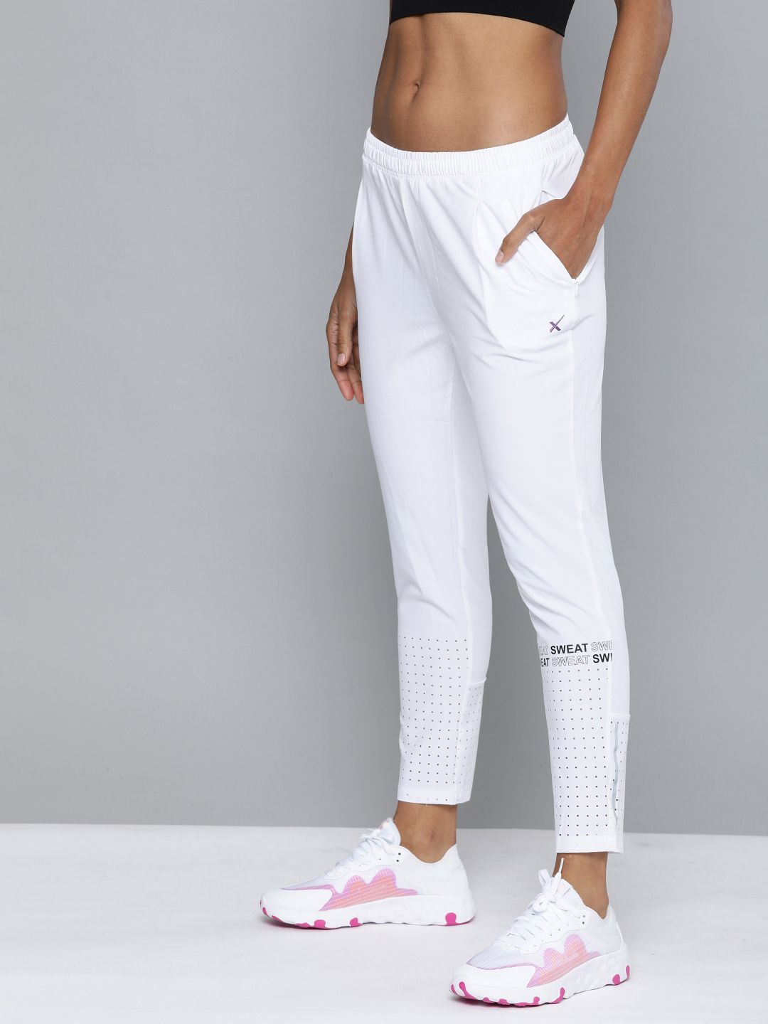 HRX by Hrithik Roshan Women White Solid Slim Rapid Dry Antimicrobial Training Track Pants Price in India