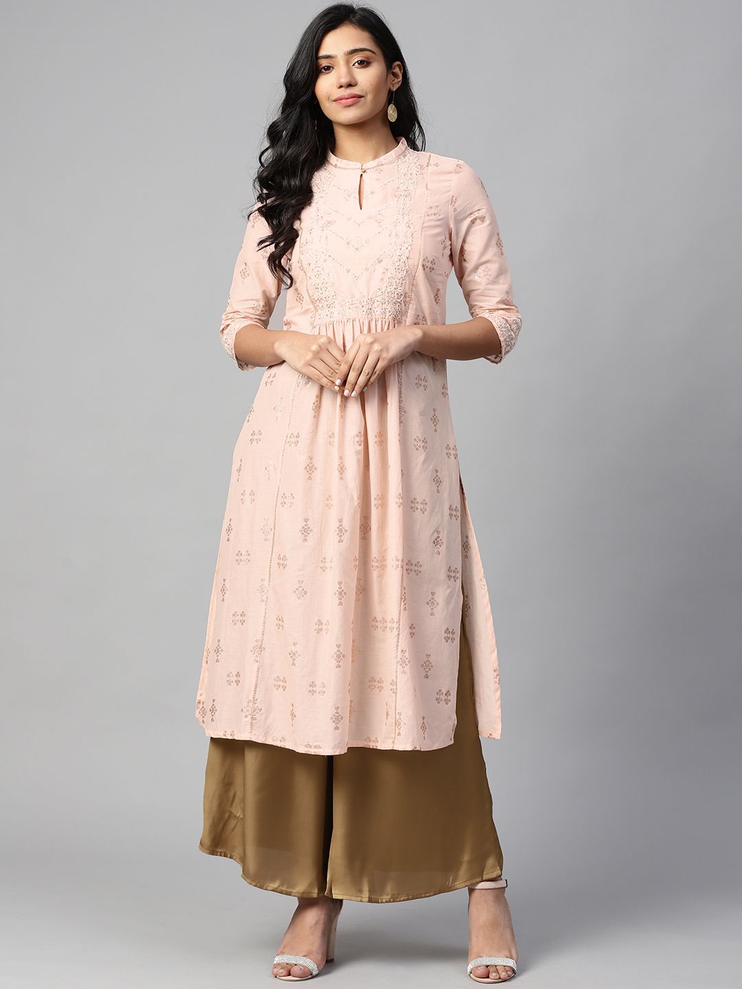 W Women Peach-Coloured Glitter Print Floral Embroidery A-Line Kurta with Sequin Detail Price in India