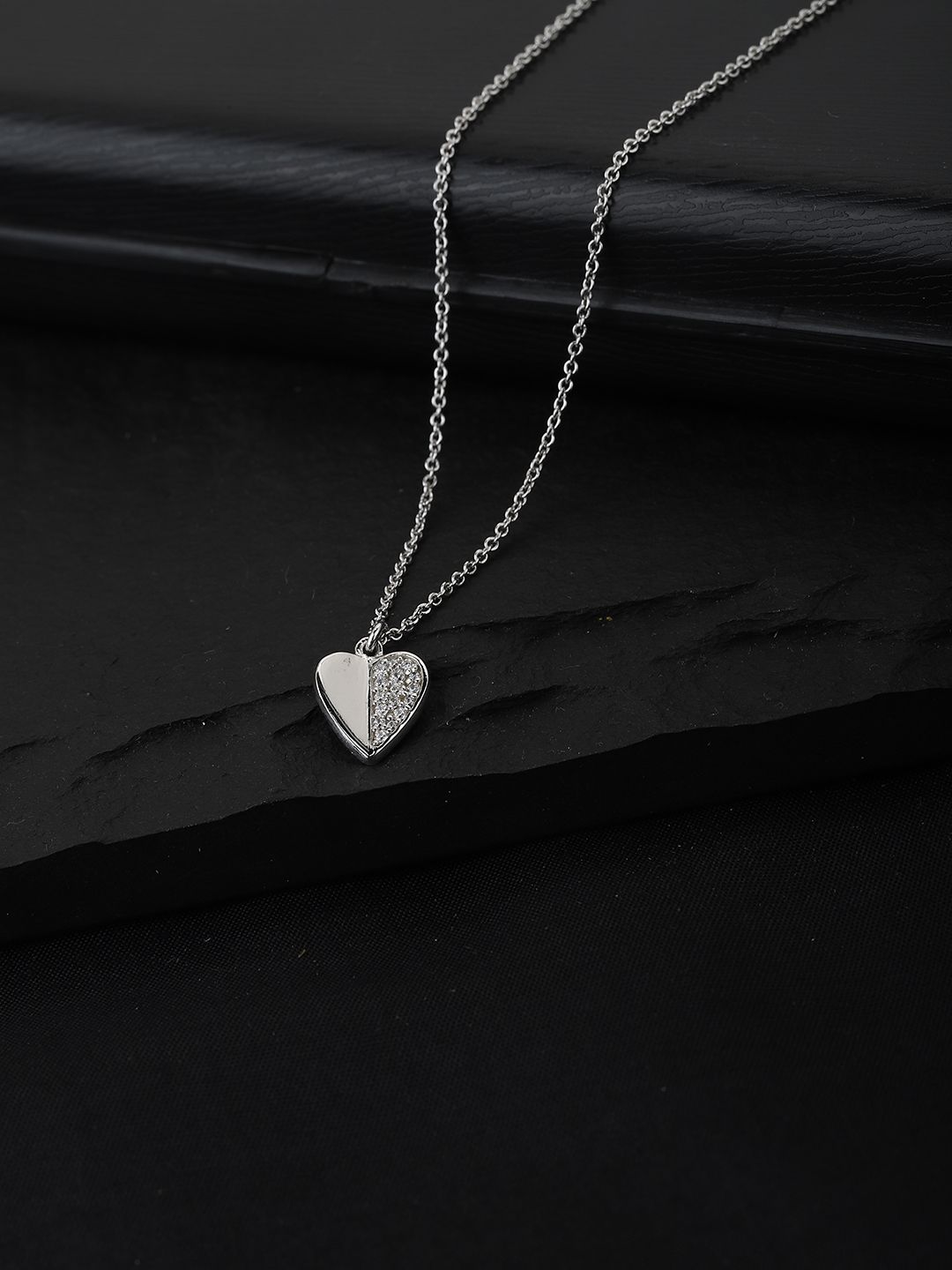 Carlton London Silver Toned Rhodium Plated CZ Studded Heart Shaped Minimal Necklace Price in India
