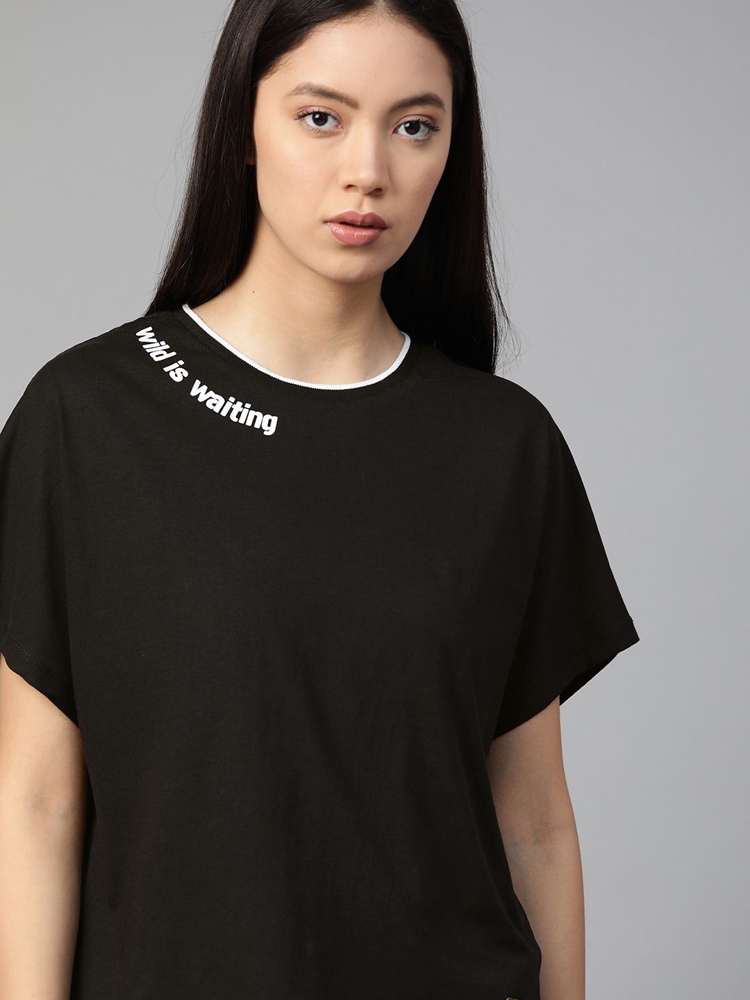 Roadster Women Black Solid Round Neck Pure Cotton T-shirt Price in India