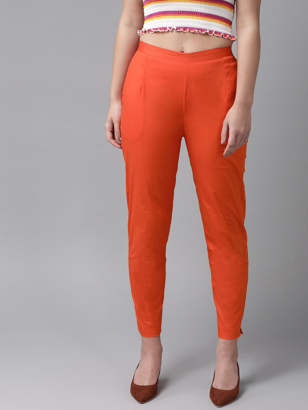 Ginni Arora Label Women Orange Slim Fit Solid Regular Trousers Price in India