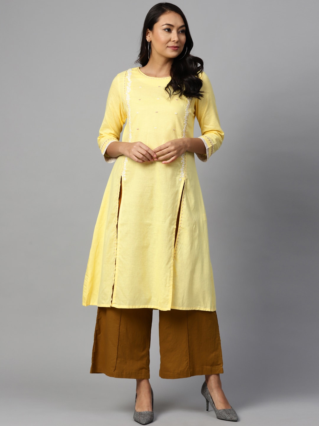 W Women Yellow Embroidered A-Line Kurta Price in India