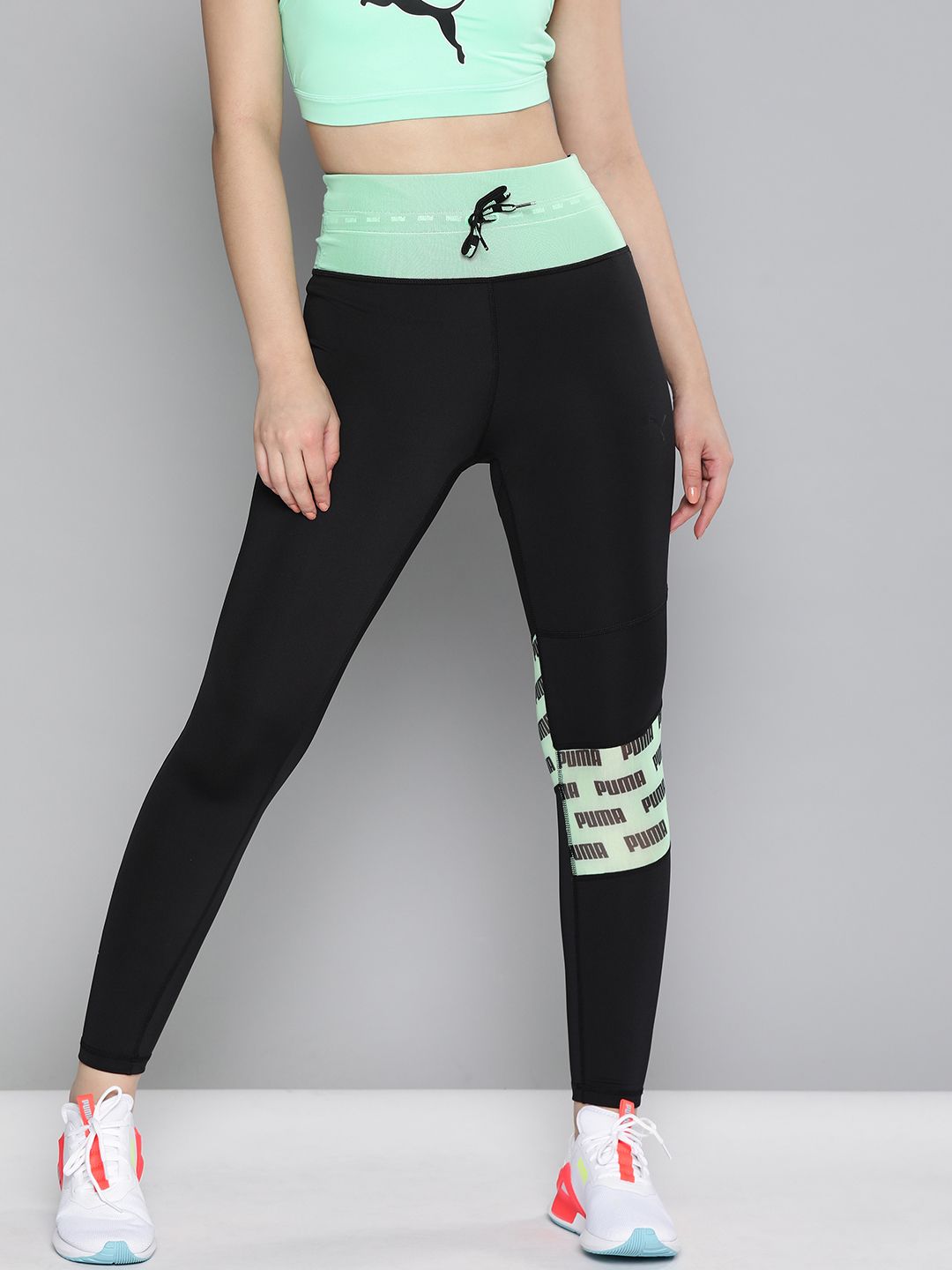 Puma Women Black Feel It Mesh 7/8 Solid Tights with Printed Detailing Price in India