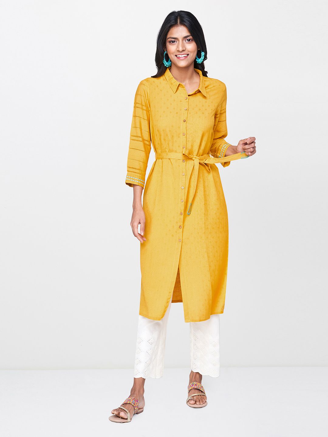 Global Desi Women Mustard Yellow Self Design Tunic with Embroidered Detail Price in India