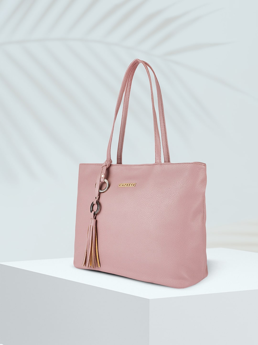 Caprese Pink Solid Shoulder Bag Price in India