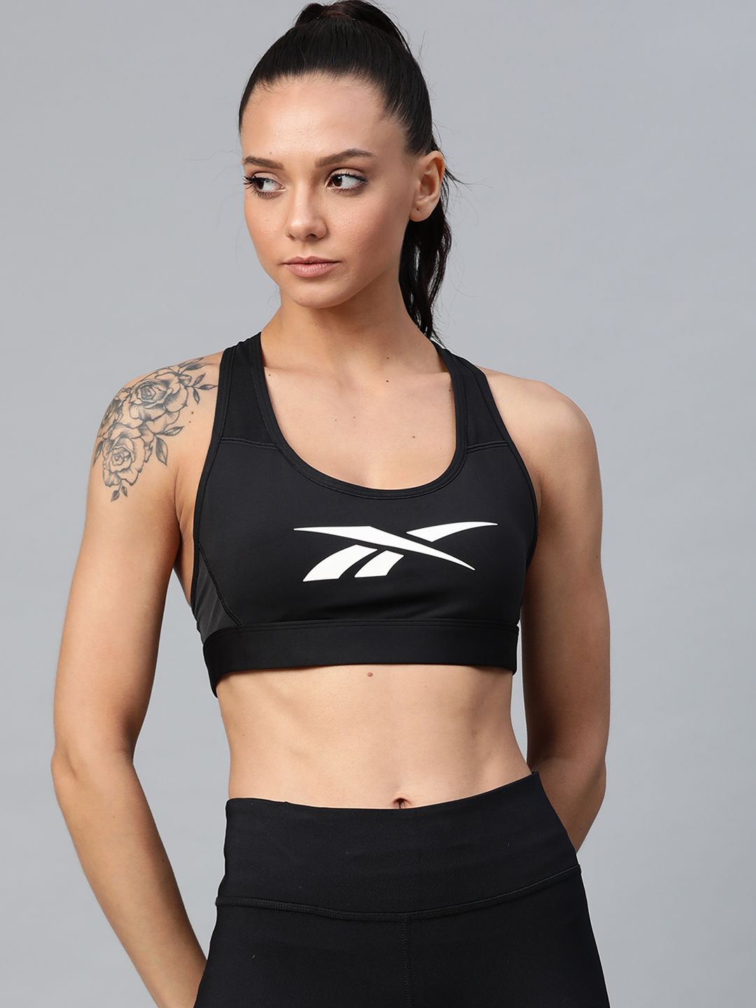 Reebok Black Printed Non-Wired Lightly Padded S Hero Sports Bra FK5315 Price in India