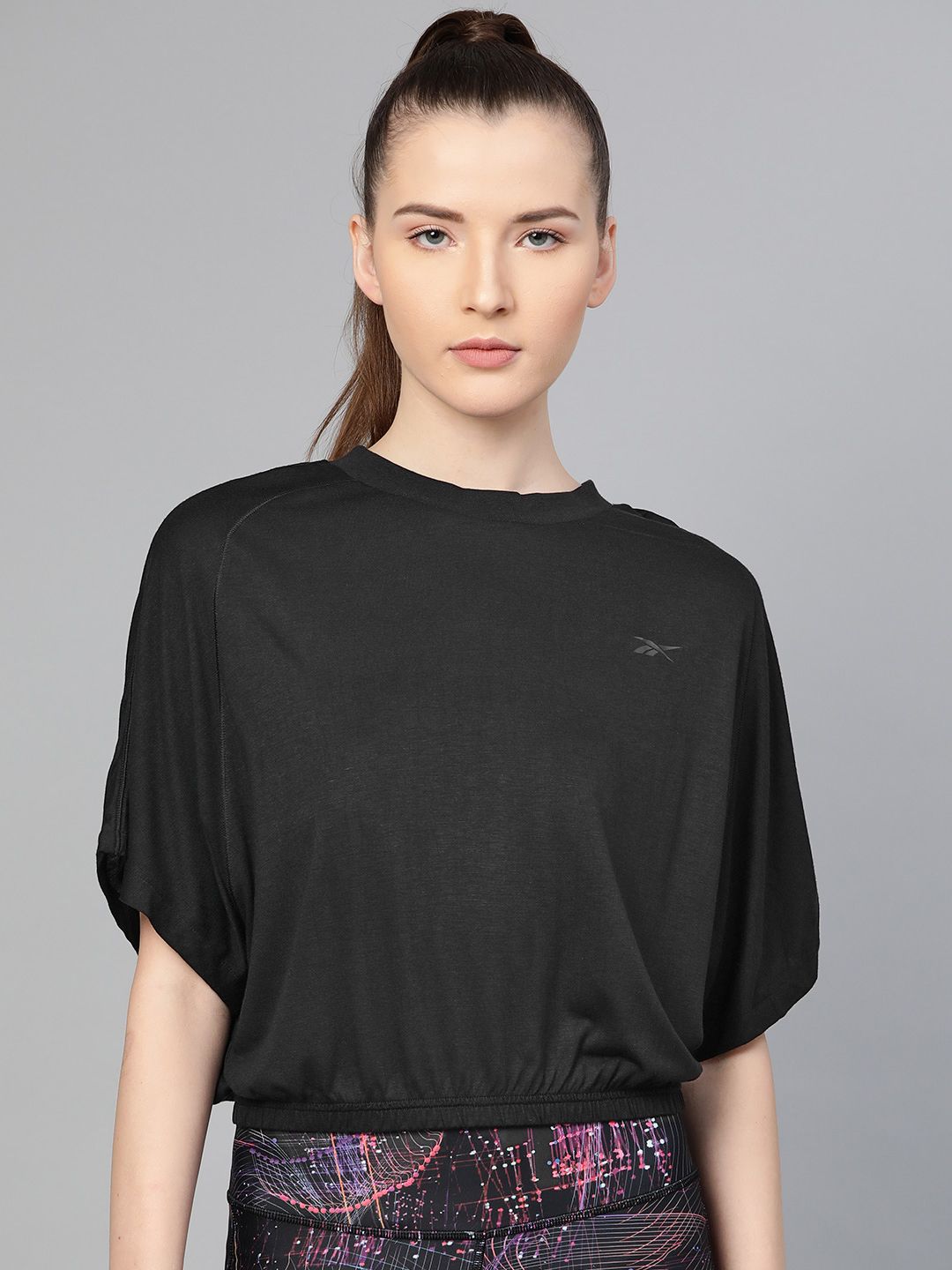 Reebok Women Black Solid Restorative Studio T-shirt Price in India