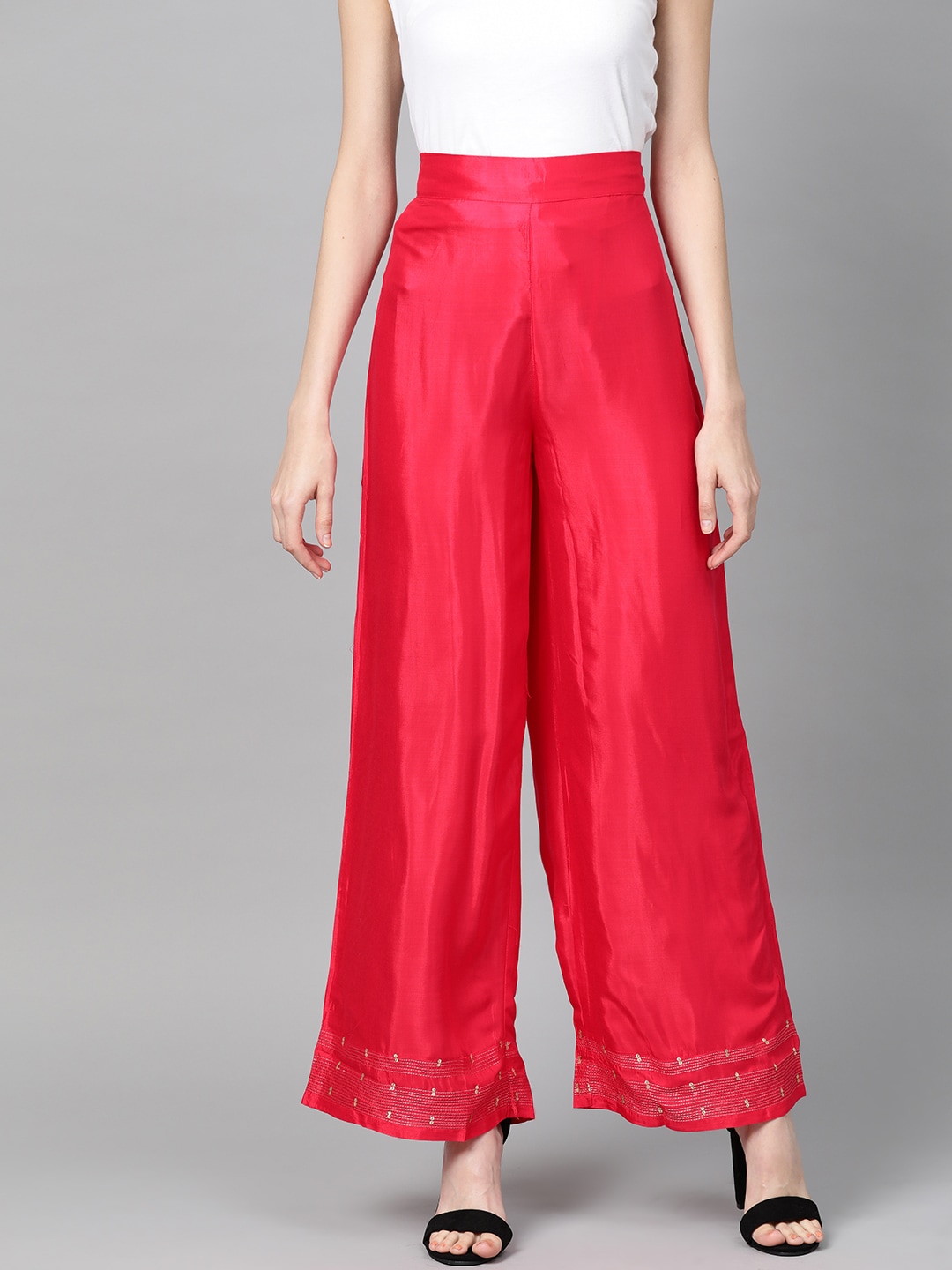 W Women Magenta Solid Flared Palazzos Price in India