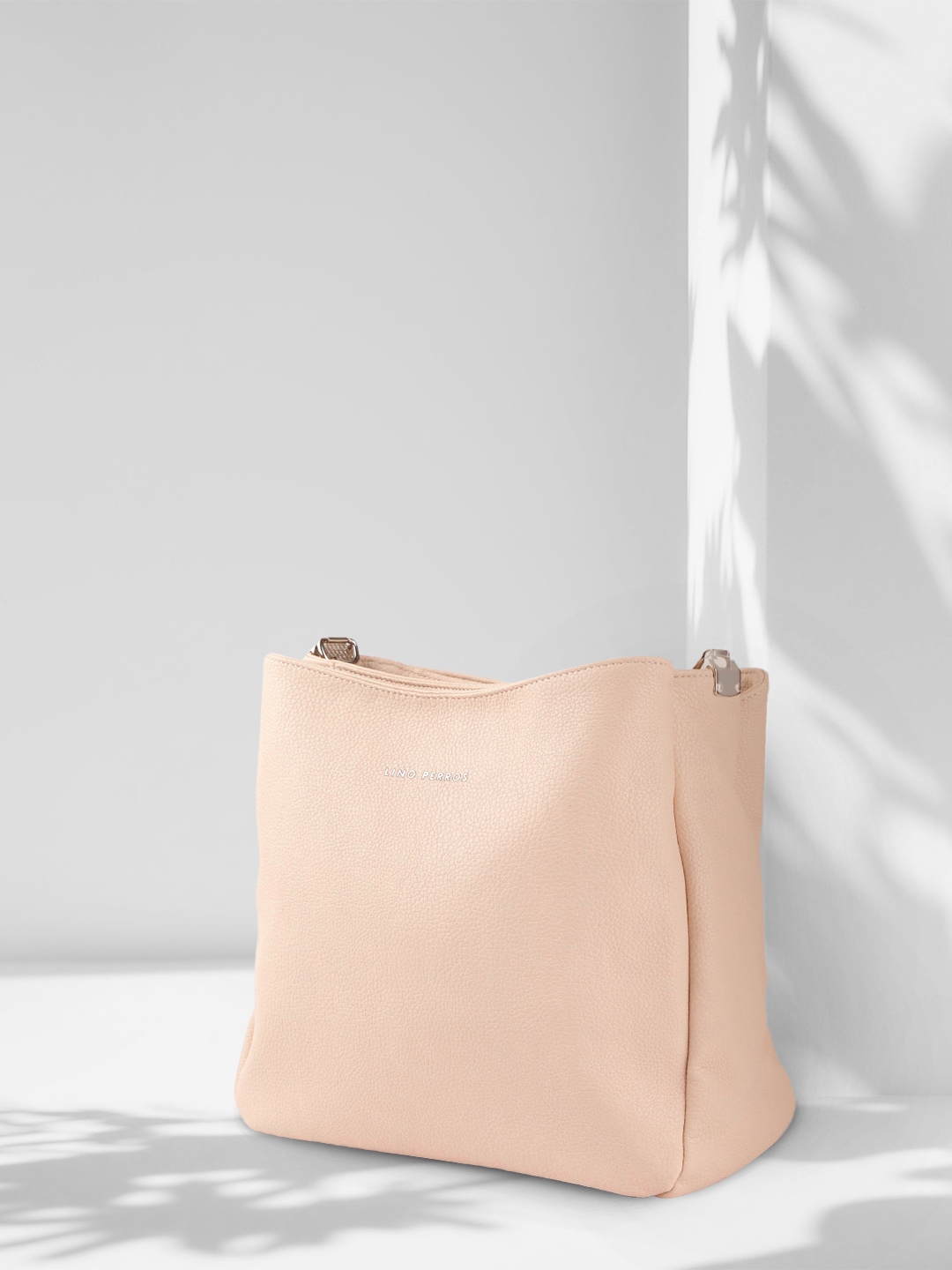Lino Perros Peach-Coloured Solid Hobo Bag Price in India