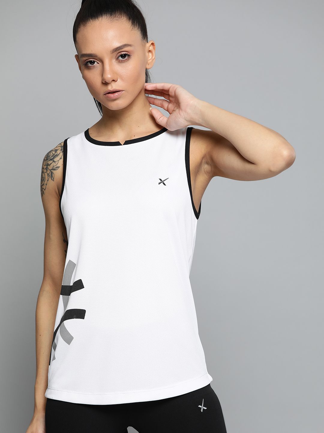 HRX By Hrithik Roshan Women Brilliant White Printed Rapid-Dry Racket Sports Tank Top Price in India