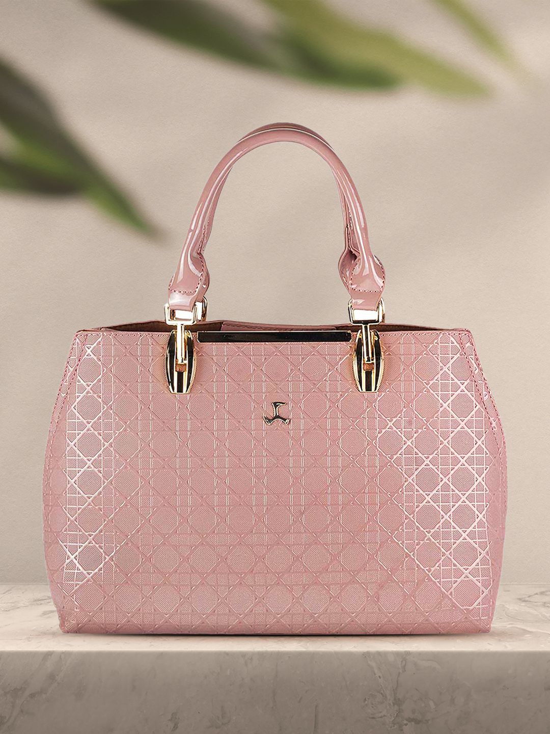 Mochi Pink Textured Handheld Bag Price in India